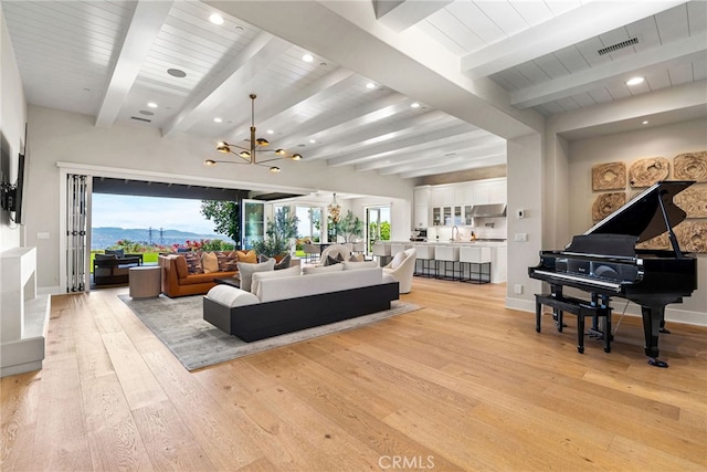 30 Catalina Vista Rd, Ladera Ranch, CA 92694 - living room with a chandelier, light wood-type flooring, recessed lighting, and a wooden ceiling with exposed beams