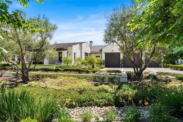 30 Catalina Vista Rd, Ladera Ranch, CA 92694 - view of front of home featuring stucco siding, concrete driveway, and an attached garage