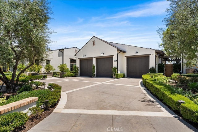 30 Catalina Vista Rd, Ladera Ranch, CA 92694 - view of front of home with a garage, driveway, and stucco siding