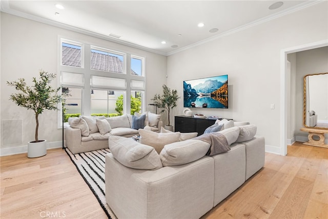 30 Catalina Vista Rd, Ladera Ranch, CA 92694 - living room with light wood-type flooring, crown molding, recessed lighting, and a towering ceiling