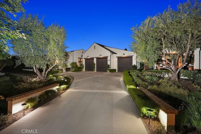 30 Catalina Vista Rd, Ladera Ranch, CA 92694 - view of front of house with concrete driveway, a garage, and stucco siding