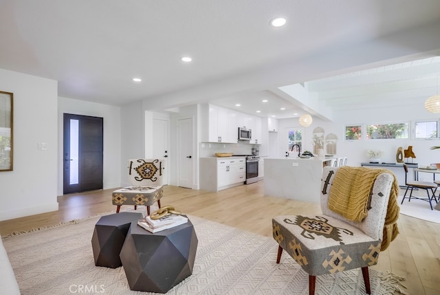 4532 Zella Ln, Yorba Linda, CA 92886 - living room featuring light wood-style floors and recessed lighting