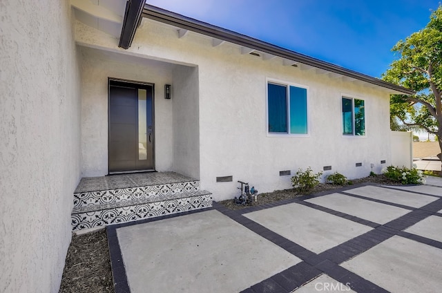 4532 Zella Ln, Yorba Linda, CA 92886 - property entrance with crawl space, a patio area, and stucco siding