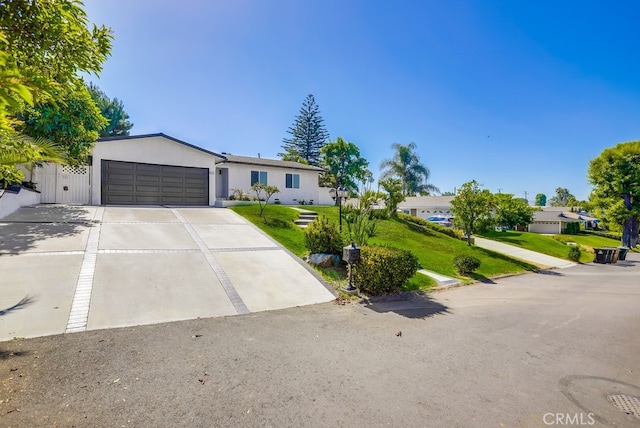 4532 Zella Ln, Yorba Linda, CA 92886 - single story home featuring concrete driveway, a garage, a front lawn, and stucco siding