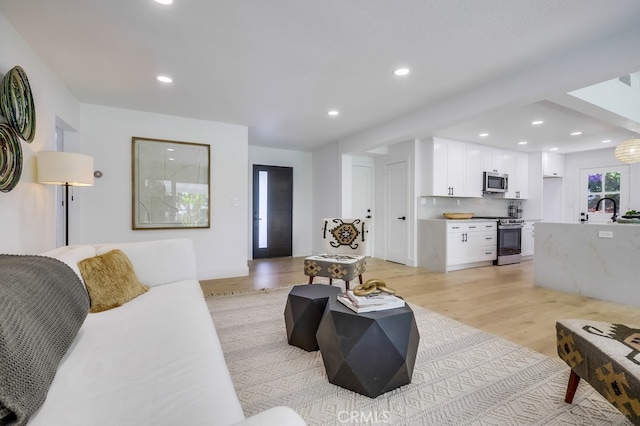 4532 Zella Ln, Yorba Linda, CA 92886 - living room with light wood finished floors and recessed lighting