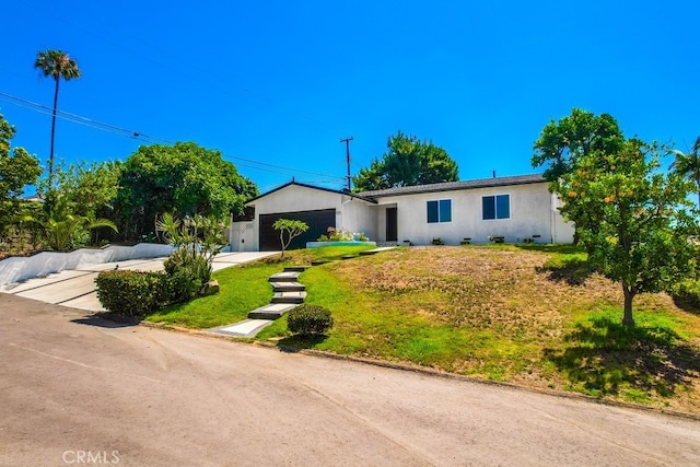 4532 Zella Ln, Yorba Linda, CA 92886 - ranch-style house with a garage, stucco siding, driveway, and a front lawn