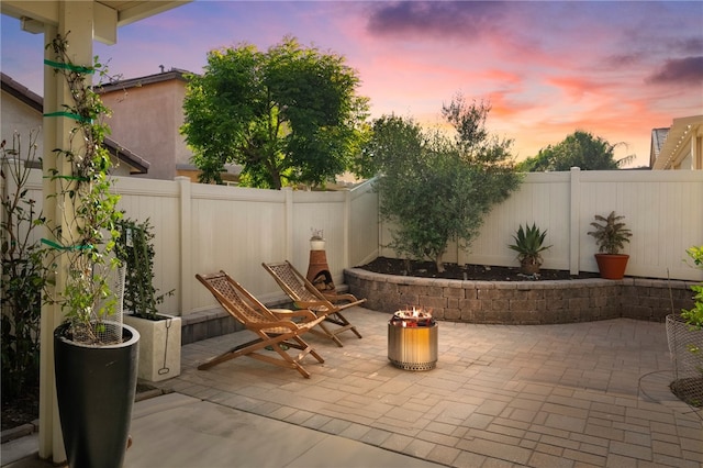 4040 Quartzite Ln, San Bernardino, CA 92407 - fenced backyard with a patio