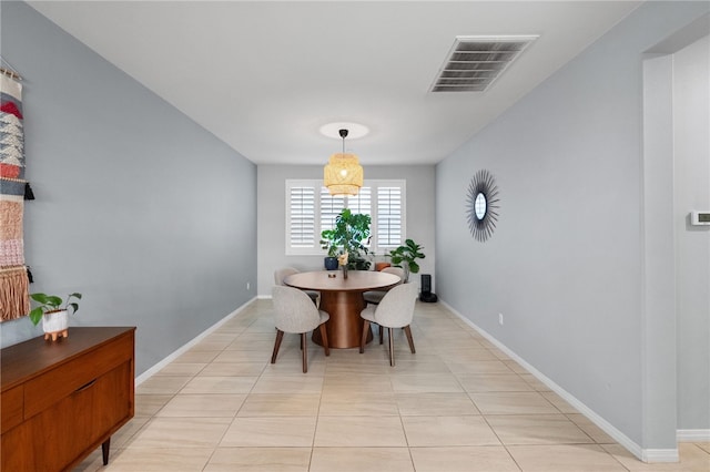 4040 Quartzite Ln, San Bernardino, CA 92407 - dining space with baseboards and light tile patterned flooring