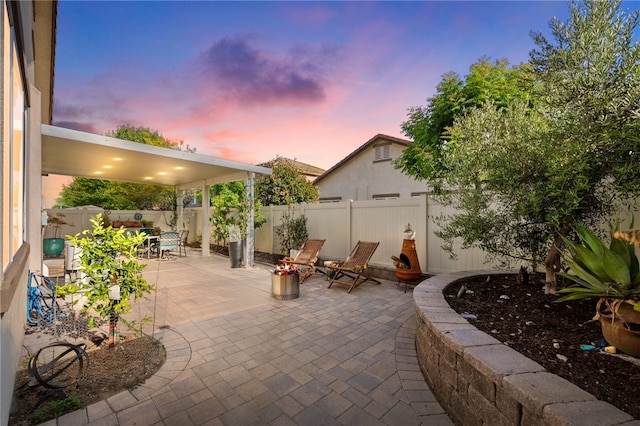 4040 Quartzite Ln, San Bernardino, CA 92407 - fenced backyard featuring a patio area