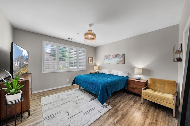 4040 Quartzite Ln, San Bernardino, CA 92407 - bedroom featuring wood finished floors and baseboards