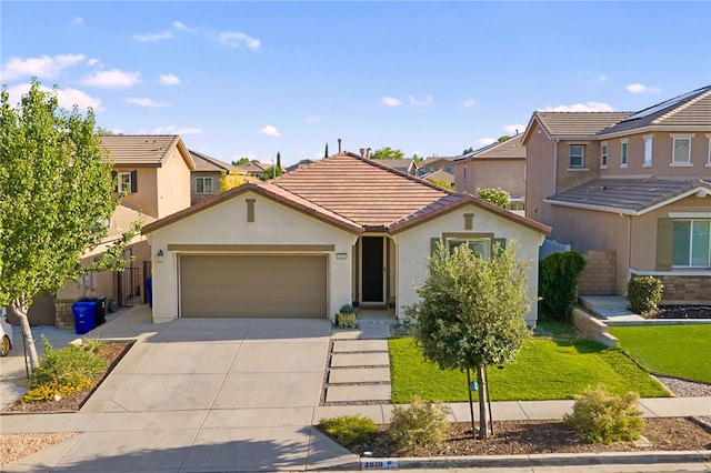 4040 Quartzite Ln, San Bernardino, CA 92407 - view of front facade featuring concrete driveway, stucco siding, an attached garage, and a residential view