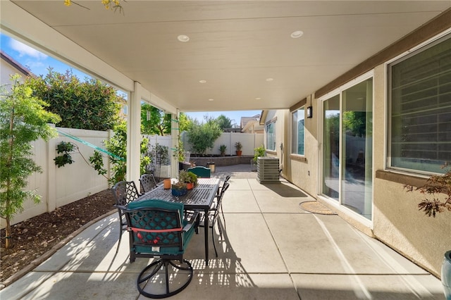 4040 Quartzite Ln, San Bernardino, CA 92407 - fenced backyard with a patio area and outdoor dining area