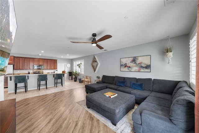 4040 Quartzite Ln, San Bernardino, CA 92407 - living room featuring ceiling fan, recessed lighting, and light wood-style flooring