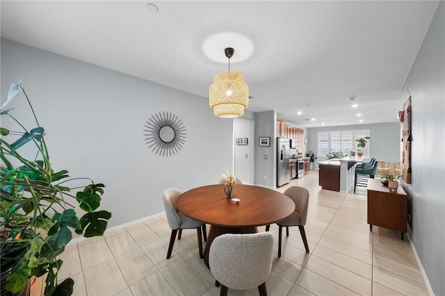 4040 Quartzite Ln, San Bernardino, CA 92407 - dining room with light tile patterned floors and recessed lighting