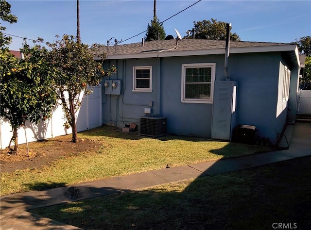 12843 Columbia Way, Downey, CA 90242 - back of property with a shingled roof and stucco siding