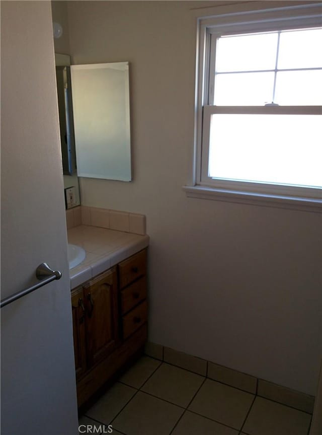 12843 Columbia Way, Downey, CA 90242 - bathroom with vanity and tile patterned floors