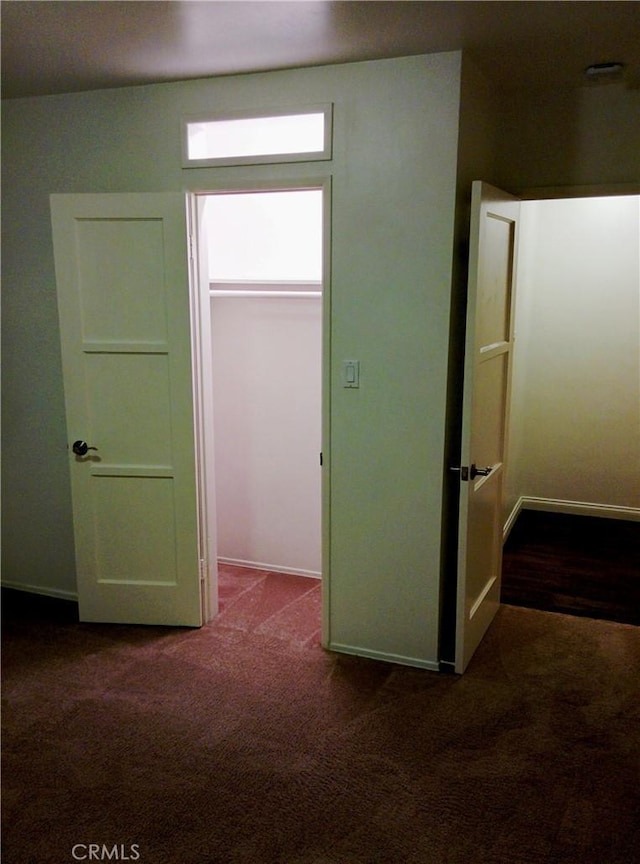 12843 Columbia Way, Downey, CA 90242 - corridor with dark colored carpet