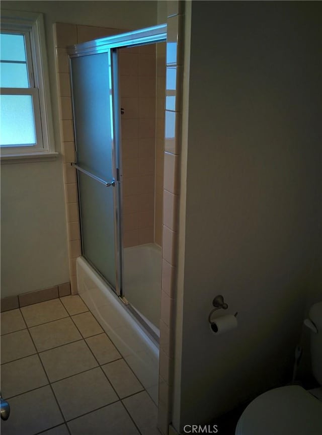 12843 Columbia Way, Downey, CA 90242 - full bathroom with tile patterned flooring and enclosed tub / shower combo