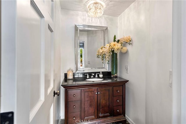 17437 Tarzana St, Encino, CA 91316 - bathroom featuring vanity and a chandelier