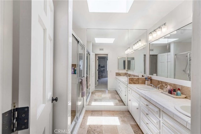 17437 Tarzana St, Encino, CA 91316 - full bath featuring a skylight, double vanity, and a stall shower