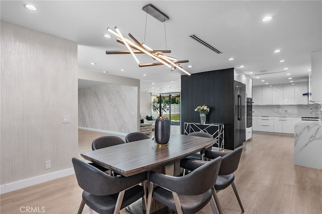 16810 Adlon Rd, Encino, CA 91436 - dining room featuring recessed lighting and light wood finished floors