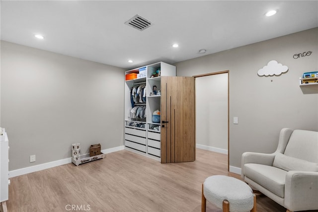 16810 Adlon Rd, Encino, CA 91436 - sitting room with light wood finished floors and recessed lighting