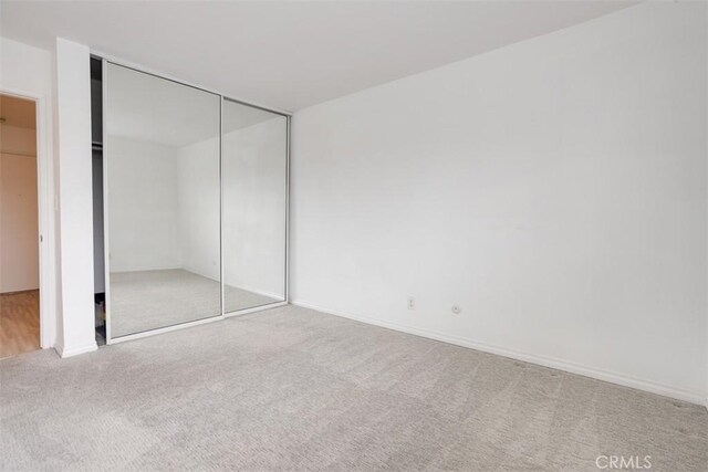 4727 W 147th St Unit 133, Lawndale, CA 90260 - unfurnished bedroom featuring carpet floors and a closet
