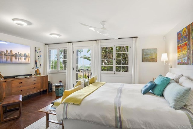 308 Sunset Dr Unit A, Encinitas, CA 92024 - bedroom with access to outside and dark wood-type flooring