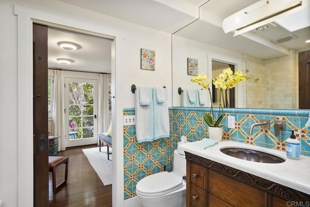 308 Sunset Dr Unit A, Encinitas, CA 92024 - bathroom with vanity, tile walls, and wood finished floors