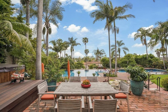 308 Sunset Dr Unit A, Encinitas, CA 92024 - view of patio / terrace featuring a hot tub, an outdoor pool, and outdoor dining area
