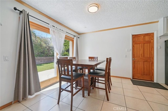 18472 Dragonera Dr, Rowland Heights, CA 91748 - dining space with crown molding, a textured ceiling, and light tile patterned floors