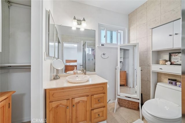18472 Dragonera Dr, Rowland Heights, CA 91748 - full bath with vanity, a stall shower, tile walls, and tile patterned flooring