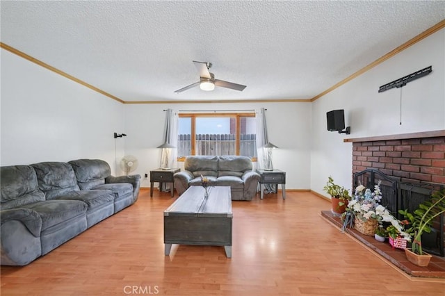 18472 Dragonera Dr, Rowland Heights, CA 91748 - living area featuring ornamental molding, ceiling fan, light wood-style flooring, a textured ceiling, and a brick fireplace