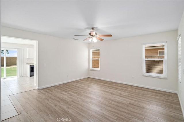 45722 Palm Ln, Lancaster, CA 93535 - spare room featuring a ceiling fan and light wood-style flooring