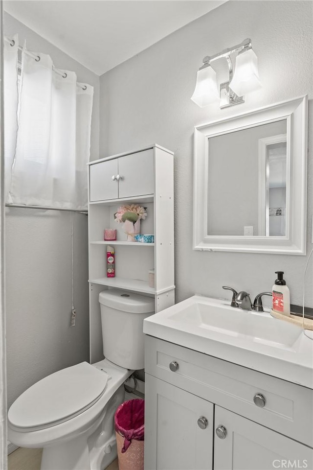 624 N Yucca Ave, Rialto, CA 92376 - bathroom with vanity and toilet