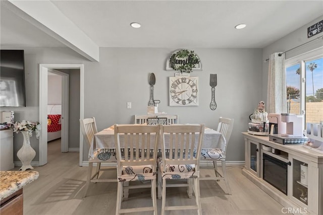 624 N Yucca Ave, Rialto, CA 92376 - dining room with light wood-style flooring and recessed lighting