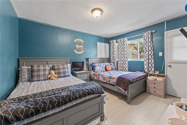 624 N Yucca Ave, Rialto, CA 92376 - bedroom with light wood-type flooring
