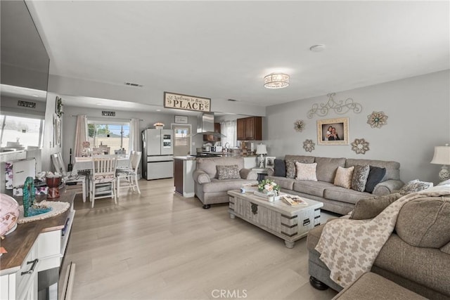 624 N Yucca Ave, Rialto, CA 92376 - living room featuring light wood-type flooring