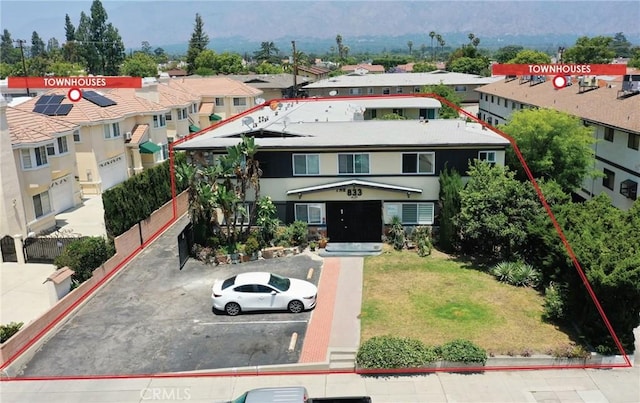 833 W Duarte Rd Unit 11, Arcadia, CA 91007 - view of front facade featuring uncovered parking and a residential view