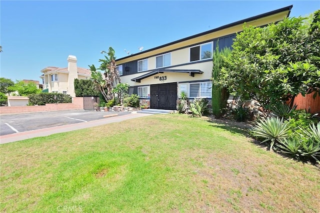 833 W Duarte Rd Unit 11, Arcadia, CA 91007 - view of front of house with stucco siding and uncovered parking