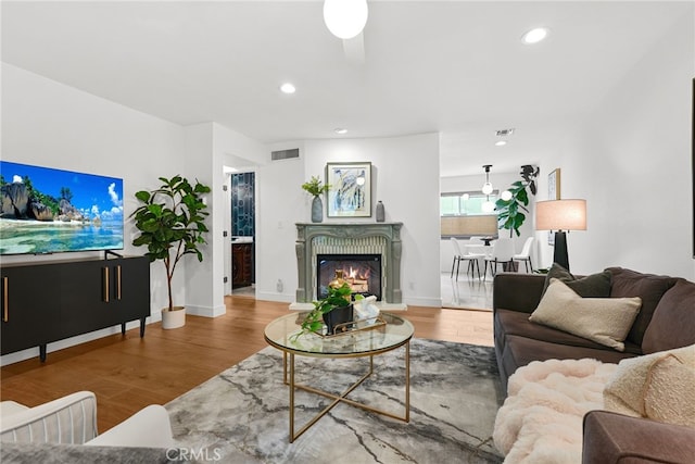 9403 Via Yolanda, Burbank, CA 91504 - living area featuring wood finished floors, recessed lighting, and a warm lit fireplace