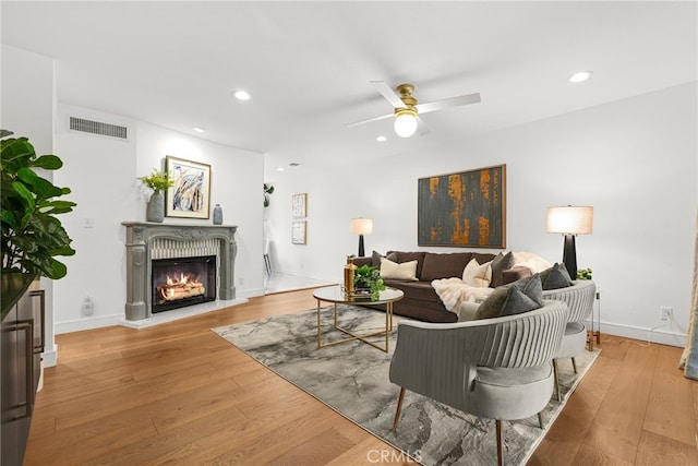 9403 Via Yolanda, Burbank, CA 91504 - living room featuring ceiling fan, wood finished floors, a lit fireplace, and recessed lighting