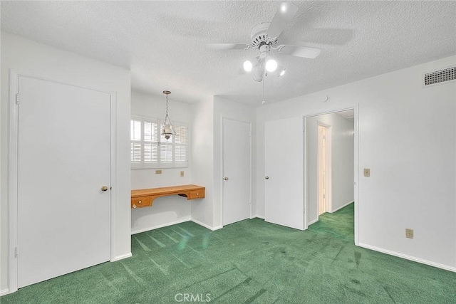 9465 Palo Verde Ave, Fontana, CA 92335 - empty room featuring carpet flooring, ceiling fan, and a textured ceiling