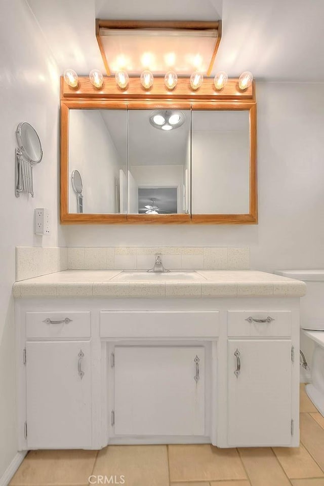 9465 Palo Verde Ave, Fontana, CA 92335 - bathroom featuring vanity and tile patterned flooring