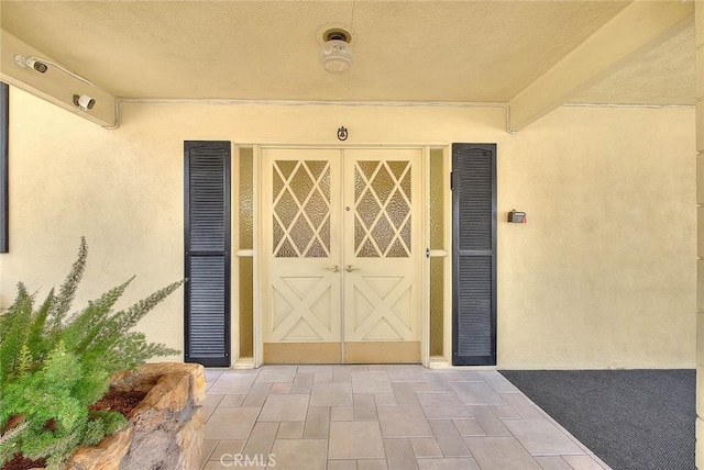 9465 Palo Verde Ave, Fontana, CA 92335 - view of exterior entry featuring stucco siding