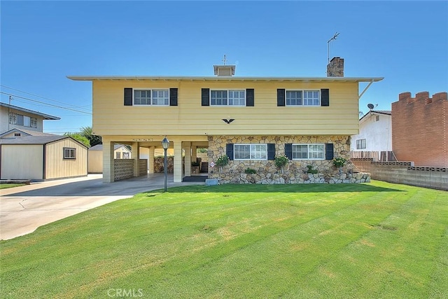 9465 Palo Verde Ave, Fontana, CA 92335 - view of front facade with concrete driveway, a storage unit, and a chimney