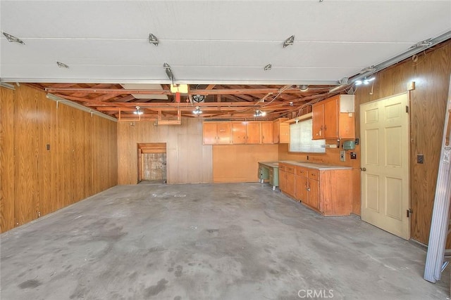 9465 Palo Verde Ave, Fontana, CA 92335 - garage featuring wooden walls