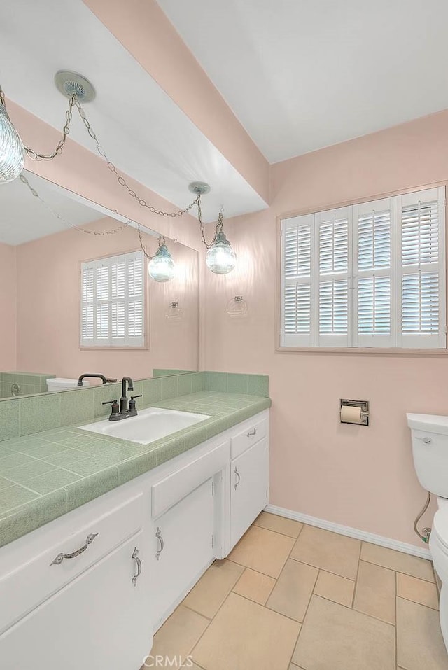 9465 Palo Verde Ave, Fontana, CA 92335 - bathroom featuring vanity, tile patterned floors, and plenty of natural light