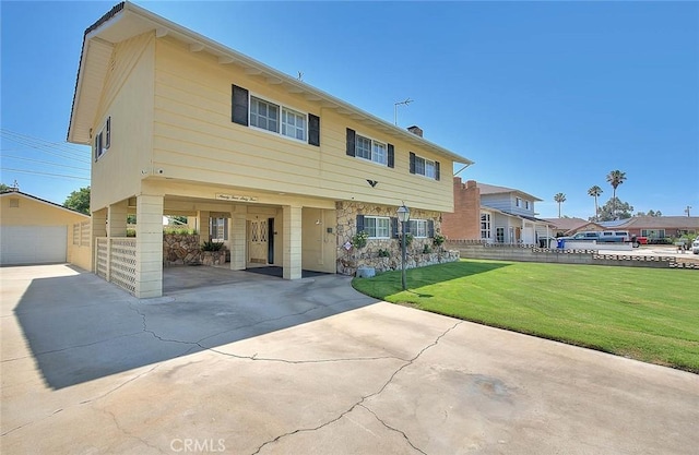 9465 Palo Verde Ave, Fontana, CA 92335 - view of front of property featuring concrete driveway, a front lawn, and an outdoor structure