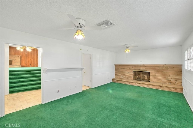 9465 Palo Verde Ave, Fontana, CA 92335 - unfurnished living room with ceiling fan, a textured ceiling, and carpet flooring